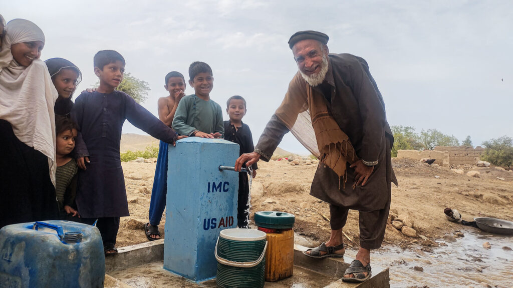 Jamil at the water point in Hujom, Afghanistan 