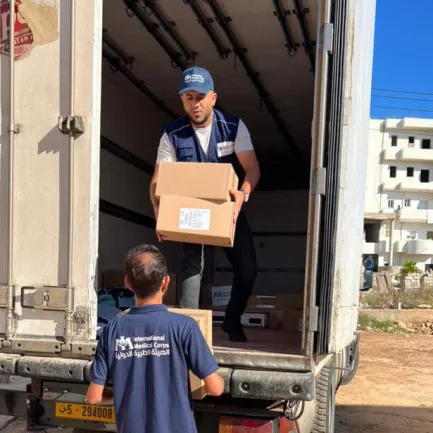 International Medical Corps staff deliver medicines and medical supplies to our EMT Type 1 Fixed primary healthcare center in Derna, Libya.