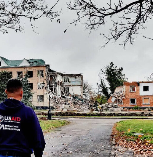 Global Security Advisor Jose Hernandez looks at a bombed-out building in Mykolaiv, Ukraine, during the first assessment trip the team made to identify threats and develop security documents in October 2022. This trip enabled International Medical Corps to open an office in Mykolaiv.